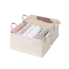 Beige cotton-linen storage bins with metal frame and riveted handles, showcasing natural texture, 2-pack.