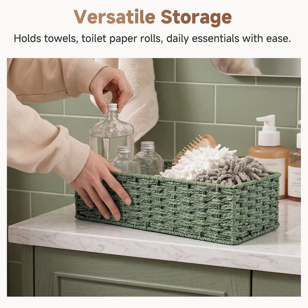 Handwoven Sage Green paper rope toilet paper basket, smooth texture, holds bathroom essentials on countertop.