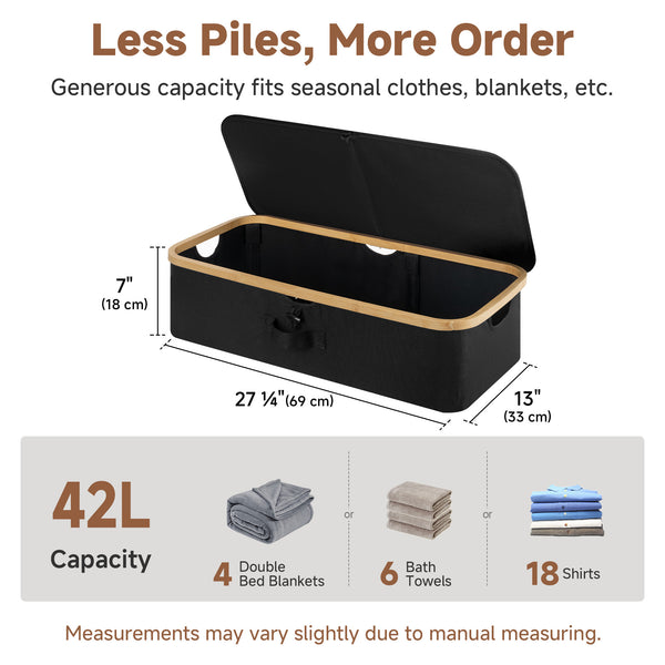 Underbed storage box with bamboo frame, black fabric, flip-top lid, and handles; dimensions: 27¼"x13"x7".